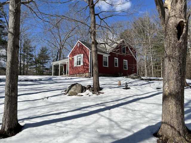 view of yard covered in snow