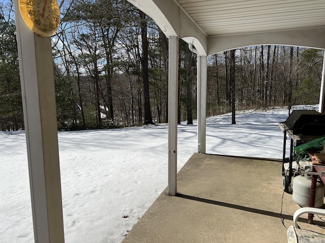 view of snow covered patio