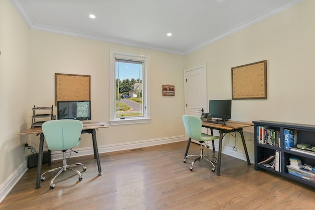 home office with ornamental molding, recessed lighting, baseboards, and wood finished floors