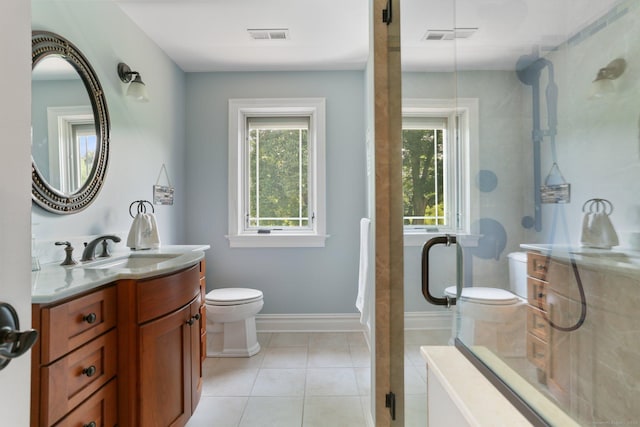 full bathroom featuring tile patterned flooring, toilet, visible vents, vanity, and a shower stall