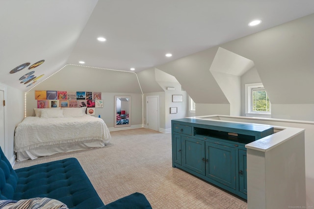 bedroom with light carpet, vaulted ceiling, baseboards, and recessed lighting