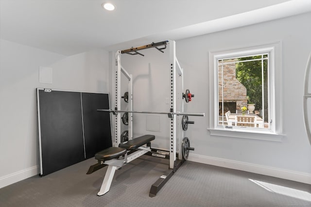 workout room with carpet, baseboards, and recessed lighting