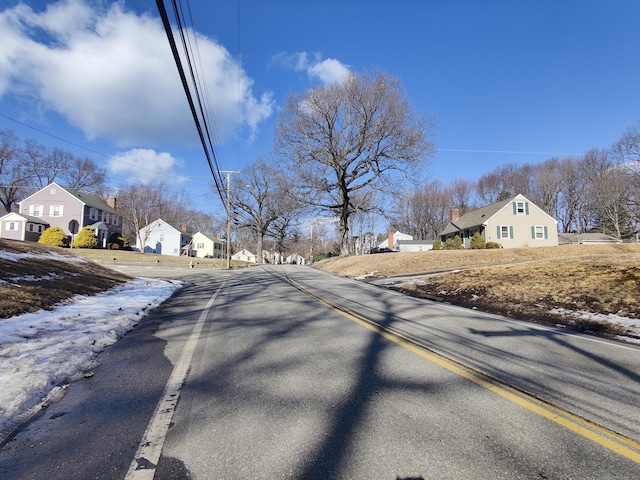 view of road with a residential view