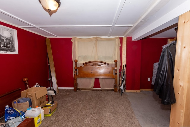 carpeted bedroom featuring baseboards