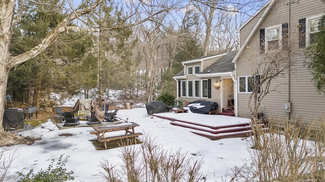 view of yard layered in snow