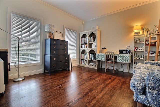 living area featuring a wealth of natural light, crown molding, baseboards, and wood finished floors