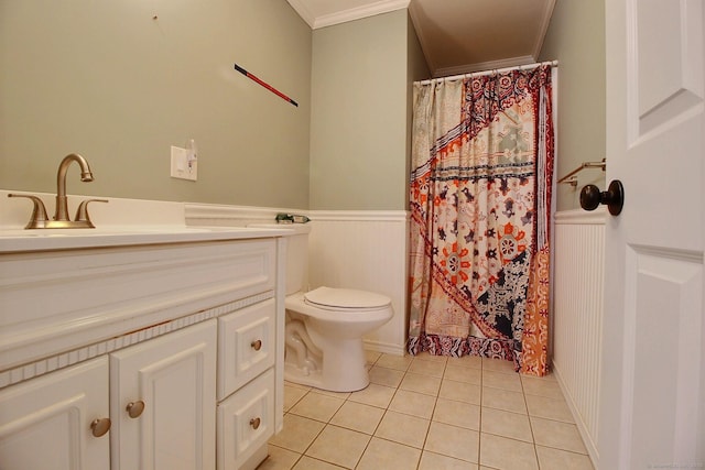 full bathroom with toilet, a wainscoted wall, ornamental molding, tile patterned flooring, and vanity