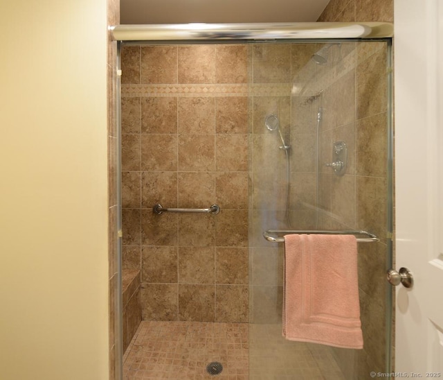 full bathroom with a shower stall