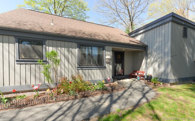 view of front of home with roof with shingles