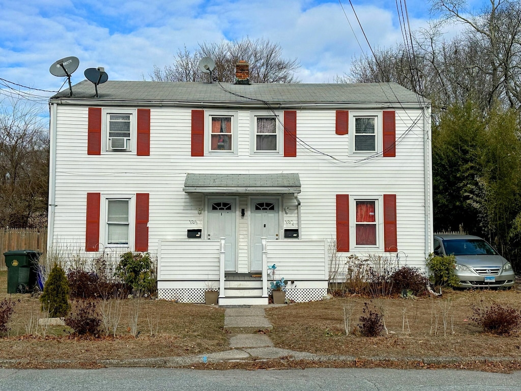 view of front of house with a chimney