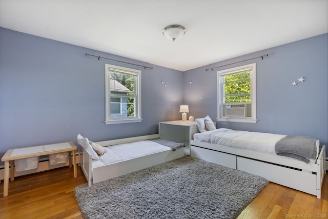 29 Maplewood Dr, Greenwich, CT 06807 - bedroom with wood finished floors and cooling unit