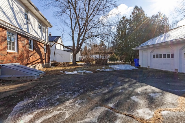 view of yard featuring a garage