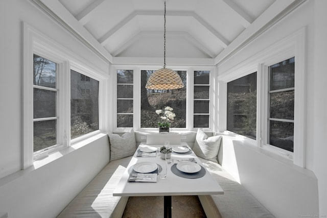 sunroom / solarium with vaulted ceiling