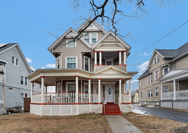 victorian-style house with covered porch