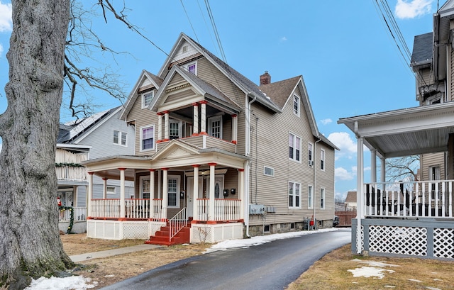 victorian-style house with a porch