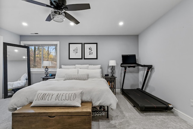 carpeted bedroom with a ceiling fan, recessed lighting, visible vents, and baseboards