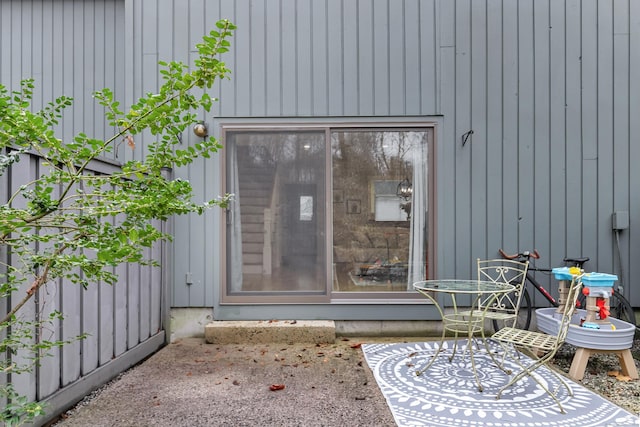 doorway to property with a patio