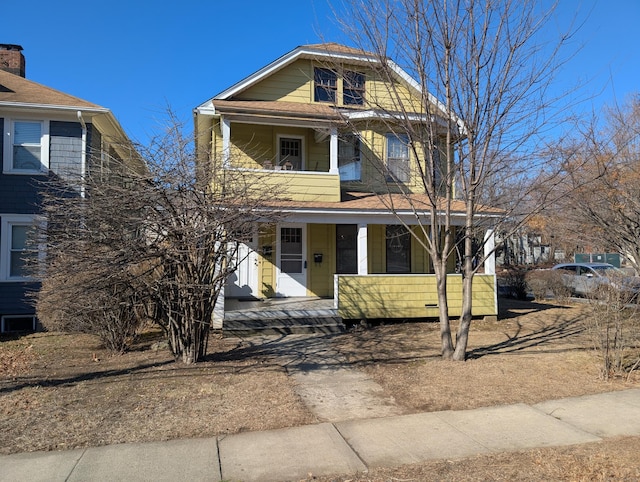 view of front facade featuring a porch and a balcony