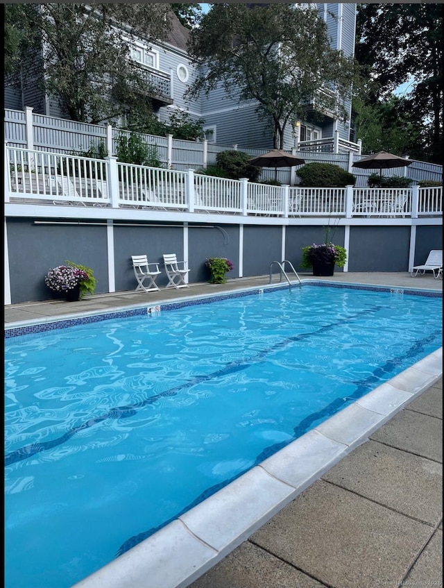 community pool with fence