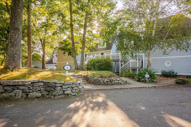 view of front of home with stairway