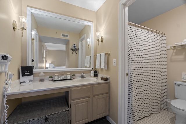 313 Old Pond Ln Unit 313, Norwich, CT 06360 - bathroom with vanity, toilet, and tile patterned floors