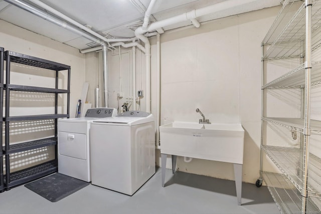 washroom featuring laundry area and washing machine and dryer