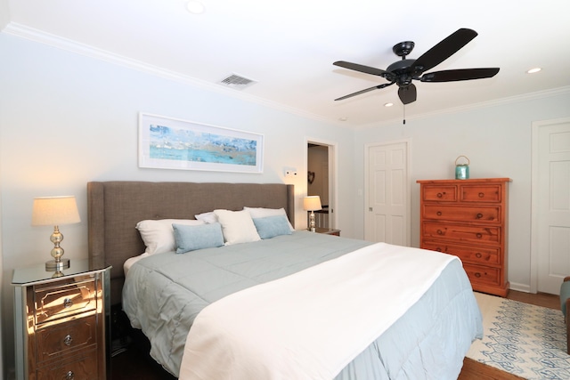 bedroom with recessed lighting, visible vents, ornamental molding, and a ceiling fan