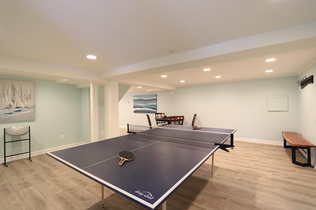 game room featuring recessed lighting, baseboards, and wood finished floors