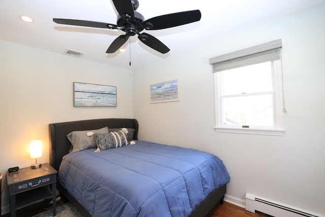 bedroom with recessed lighting, a baseboard heating unit, visible vents, baseboards, and a ceiling fan