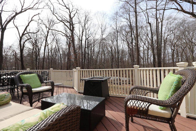 wooden deck with outdoor lounge area