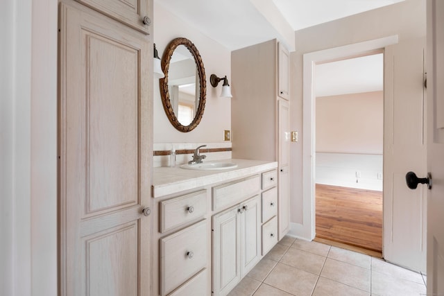 bathroom with vanity and tile patterned floors