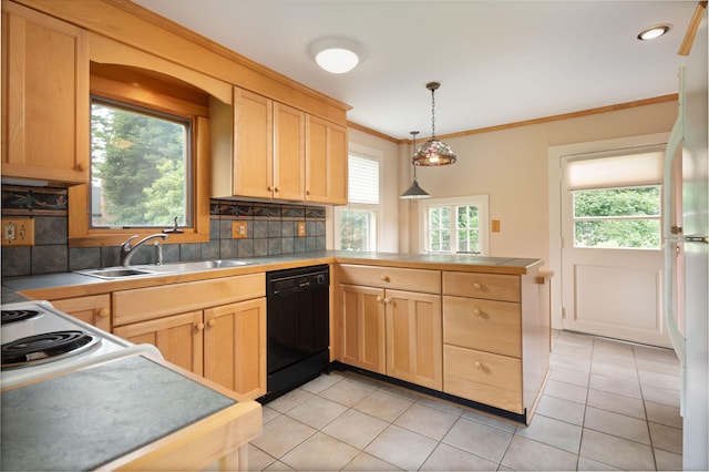 kitchen with a peninsula, a sink, black dishwasher, light brown cabinetry, and decorative light fixtures