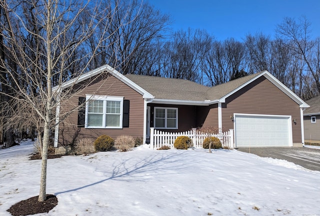 single story home featuring a garage