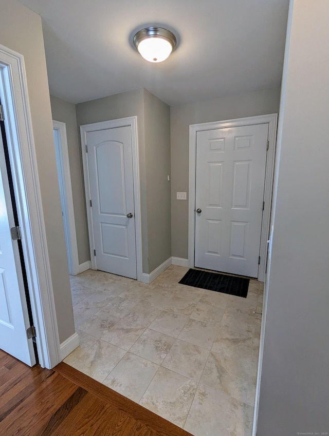 entrance foyer with baseboards