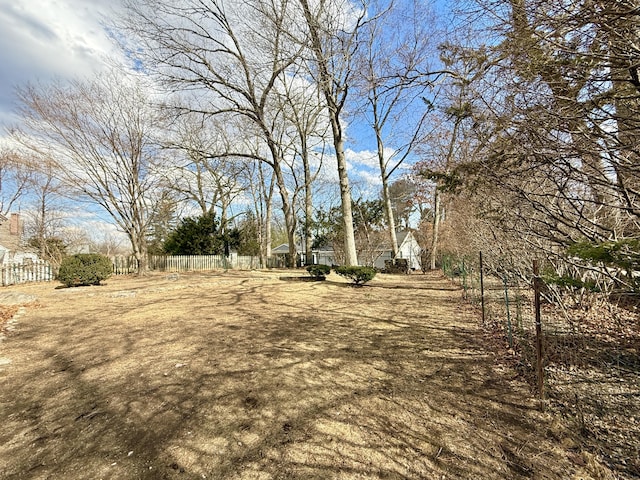 view of yard with fence