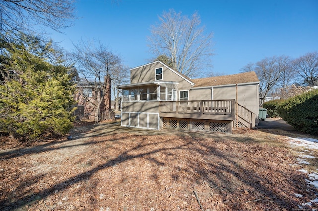 rear view of property with a deck