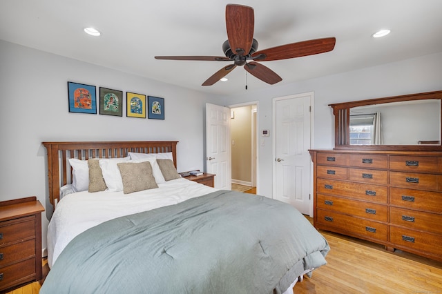 bedroom with a ceiling fan, recessed lighting, and light wood-style flooring