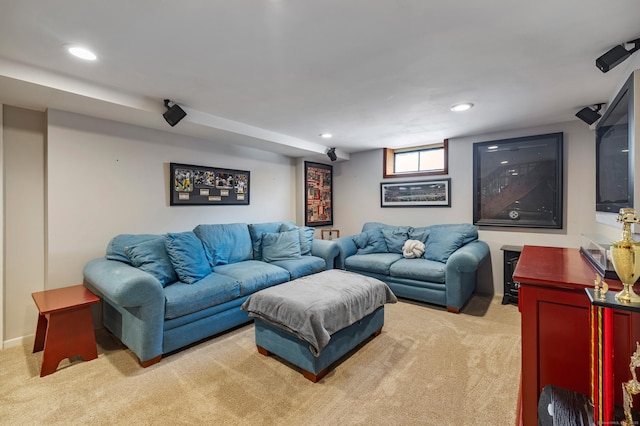 carpeted living area featuring recessed lighting