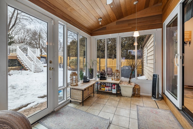 sunroom with lofted ceiling and wooden ceiling