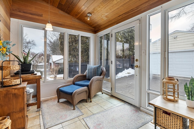 sunroom with vaulted ceiling, wooden ceiling, and a wealth of natural light