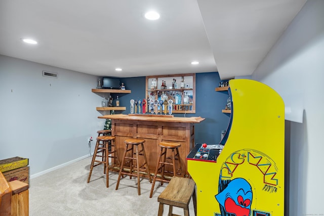 bar featuring carpet floors, a dry bar, and recessed lighting