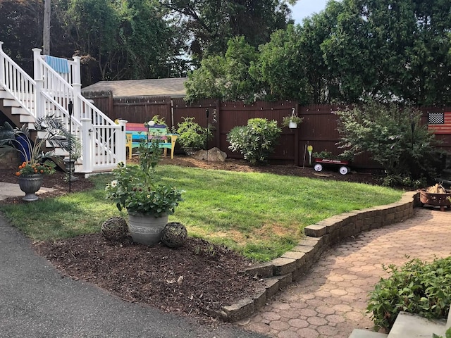 view of yard with a fenced backyard