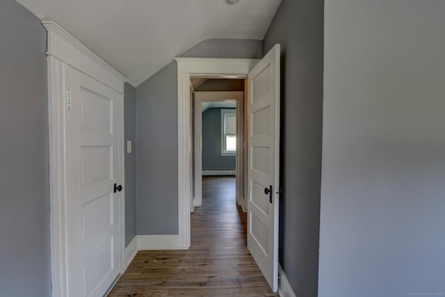 9 Crown St, Middletown, CT 06457 - corridor featuring lofted ceiling, wood finished floors, and a baseboard radiator