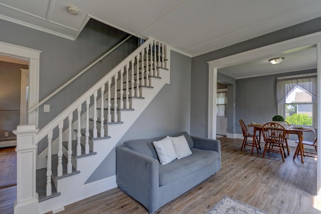 9 Crown St, Middletown, CT 06457 - living room featuring stairs, wood finished floors, and crown molding