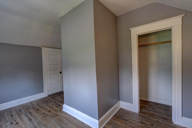 9 Crown St, Middletown, CT 06457 - unfurnished bedroom with vaulted ceiling, wood finished floors, and a closet