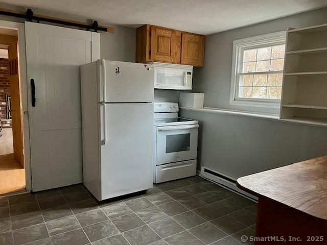 kitchen with white appliances, a barn door, baseboard heating, and brown cabinetry