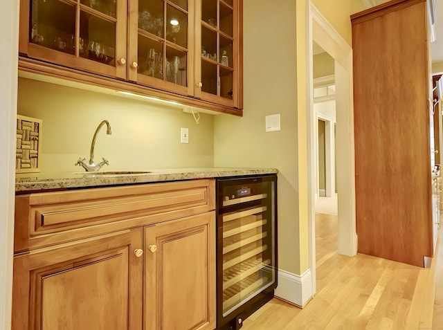 1 Wentworth Park, Farmington, CT 06032 - indoor bar with wine cooler, light wood-type flooring, and baseboards