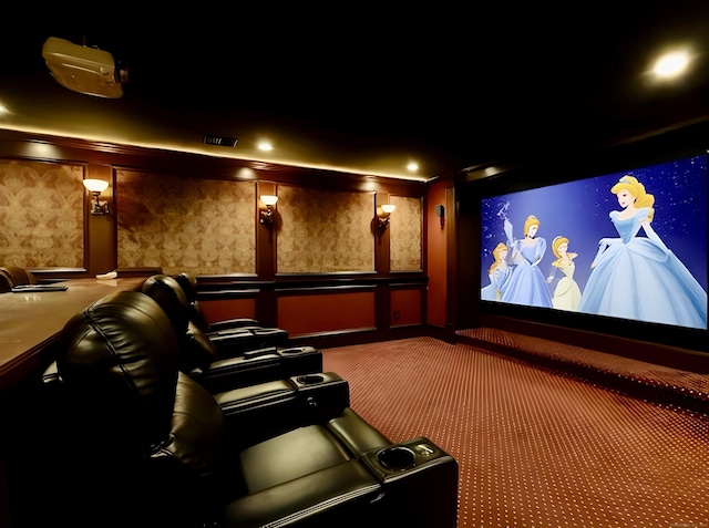 carpeted cinema with visible vents and a decorative wall