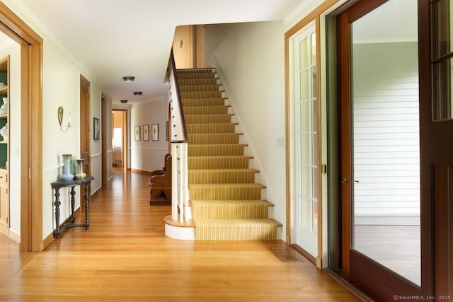 11 Valley Rd, Salisbury, CT 06039 - staircase featuring baseboards, ornamental molding, and wood finished floors