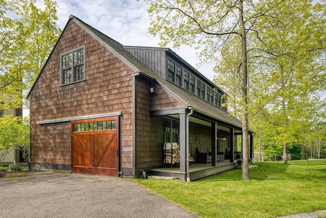 11 Valley Rd, Salisbury, CT 06039 - exterior space with a garage, roof with shingles, aphalt driveway, and a front yard